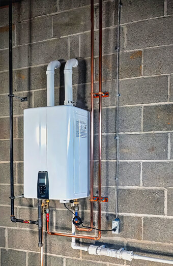 https://madeleyhotwater.com.au/uploads/2025/06/instant-hot-water-systems-83505.jpg
