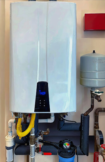 https://madeleyhotwater.com.au/uploads/2025/06/thermostatic-water-systems-75675.jpg