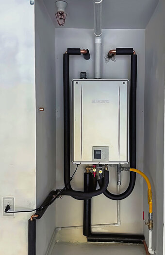 https://madeleyhotwater.com.au/uploads/2025/06/thermostatic-water-systems-92621.jpg
